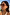 Thumbnail for Hexagon Orange Sunglasses with light-tinted lenses and script branding on the side, worn by a model.