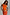 Thumbnail for Hot Coral Ribbed Tank in orange ribbed fabric, styled with a matching satin skirt and gold sun necklace.