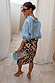 Ice Blue Miley Shirt with blouson sleeves and embroidered back neck logo, styled with a leopard print skirt.