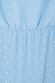 Ice Blue Plisse Tilly Dress detail featuring silver metallic flecks and an elasticated waist on pleated fabric.