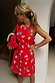 Thumbnail for Red Shell Ioana Mini Dress with a multicoloured shell print and structured silhouette, worn by a 5ft4” model in a UK size 8.