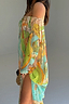 Thumbnail for Isla Jem Dress in a multi-coloured hand-painted island print, featuring stretch plisse fabric and a side slit.