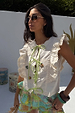Cream Isla Tia Top featuring ruffled lace sleeves, lime green tie-fronts and embroidered motifs in a cotton-linen blend.
