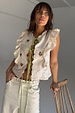 Cream Isla Tia Top featuring ruffled lace trim, green tie-front and iconic embroidered motifs.