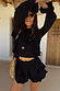 Thumbnail for Black Ruffle Shorts and matching Isla top co-ord with lace trim, tiered ruffles and embroidered sun and palm motifs.