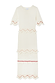 Thumbnail for Ivory and Red Harper Dress in cream cotton knit with scallop crochet details, red beading, and tiered tassels.