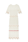 Ivory and Red Harper Dress in cream cotton knit with scallop crochet trims and red beaded tassel detailing.