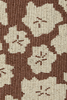 Jaden Beaded Skirt detail featuring a floral pattern made with brown and cream beads.