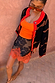 Tan Jaden Floral Mini Maeva Skirt with an orange lace hem, styled as a co-ord with a matching cardigan.