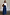 Thumbnail for Blue Denim Pallazzo Jan Jean with a wide-leg style and high-waisted fit, paired with a white shirt.