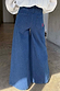 Blue Denim Pallazzo Jan Jeans featuring a wide-leg silhouette and red embroidered back pocket detail.