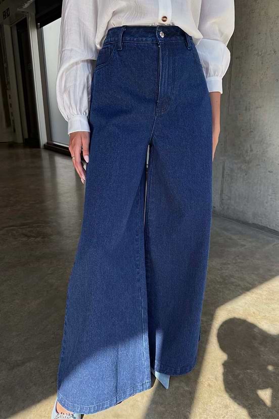 Blue Denim Pallazzo Jan Jean in indigo featuring a voluminous wide leg and high-waisted silhouette.