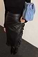 Thumbnail for Black Vegan Leather Ruffle Jaspre Skirt featuring a wrap-tie waist and frill trim detailing.