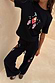 Black Night Garden Knit Joggers with colourful embroidered motifs and pink blanket-stitch side trim.