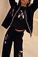 Thumbnail for Black Night Garden Knit Jogger featuring colourful embroidery and pink stitching, paired with the matching cardigan.