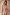 Thumbnail for Dolce Vita Josie Mini Dress featuring the iconic eye motif and halterneck scarf tie in sunset tones.