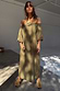 Khaki Ella Dress in a green linen blend with an off-the-shoulder ruffled neckline and side pockets.