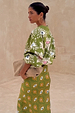 Khaki Eye Cardigan featuring embroidered eye and heart motifs, styled with a matching knitted skirt.