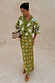 Khaki Eye Dorris Skirt with a green heart and eye print, styled with a matching cardigan for a coordinated London look.