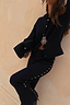 Thumbnail for Black Studded Knit Trousers and Cardigan co-ord with silver metal studs along the sides and buttons.