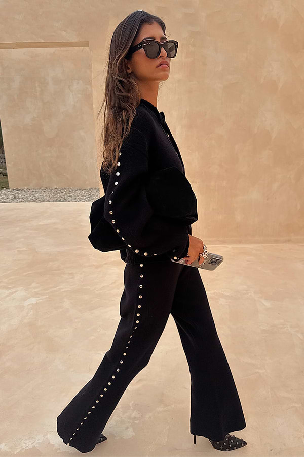 Black Studded Knit Trousers and matching cardigan with silver side studs, styled as a monochrome co-ord on a 5ft4” model.