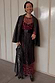 Black Leather Blazer in a relaxed fit, a transeasonal investment piece styled over a cherry print dress with fringe.