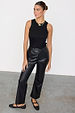 caption_Model wears Black Vegan Leather Trousers in UK size 10/ US 6