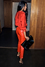Thumbnail for Deep Red Vegan Leather Trousers styled with a matching red shirt and leopard print heels.