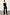 Thumbnail for Model wearing Black Vegan Leather Trousers with a high waist and straight leg, paired with a black ribbed tank top.