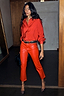 Deep Red Vegan Leather Trousers and red shirt styled with leopard print heels.
