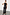 Thumbnail for High-waisted black vegan leather trousers with a straight leg, styled with a black ribbed tank top.