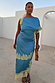 Blue and Lemon Millie Skirt in satin with an asymmetric lace hem, worn as a co-ord for inclusive sizing.