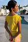 Yellow Lace Insert Top with lace detailing at the back and sleeves, captured in a poolside vacation setting.