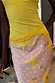 Yellow Lace Insert Top featuring an asymmetric lace hem and intricate floral lace, designed in London.