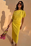 Yellow Sunshine Tilly Dress in plisse with gold flecks, worn by a 5ft7” model in size UK 10/US 6.