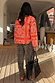 Thumbnail for Leopard Barrel Jeans in iconic animal print with a relaxed barrel leg, styled with a red paisley quilted jacket.