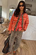 Iconic Leopard Barrel Jeans with a relaxed barrel leg, paired with a red paisley quilted jacket.