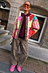 Thumbnail for Iconic Leopard Barrel Jeans in a relaxed barrel leg shape, styled with a colourful quilted jacket.