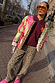 Leopard Barrel Jeans featuring an iconic leopard print and relaxed barrel leg, styled with a colourful quilted jacket.