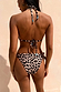 Leopard print bikini with contrast blue whipstitch detailing on halter and tie-side briefs, seen from the back.
