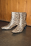 Leopard Heel Boots with a square toe and block heel, featuring animal print as a neutral wardrobe staple.