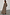 Thumbnail for Lucia Leopard Denim 55 Coat in iconic leopard print stretch denim, shown from the back in a longline fit.