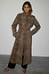 Lucia Leopard Denim 55 Coat with a tie-waist and button front, styled with matching leopard-print bow shoes.