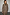 Thumbnail for Lucia Leopard Denim 55 Coat in stretch denim with leopard print and a detachable tie waist.