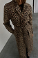 Lucia Leopard Denim 55 Coat featuring a signature animal print, tie waist and front pockets.