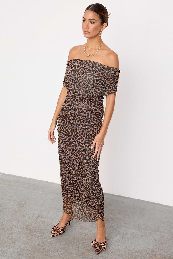 Leopard Diaz Dress with a leopard print mesh, off-the-shoulder neckline and ruched detailing.