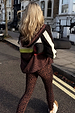 Leopard Windbreaker Jacket with a hood and neon stripe, paired with matching leggings and a yoga mat in London.
