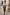 Thumbnail for Iconic Brown Leopard Jaspre wrap skirt styled with a light blue button-down shirt and tan sandals.