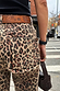 Leopard Lucia Scallop Detail Jeans featuring scalloped pockets and embroidered logo in a street setting.