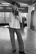 Leopard Lucia Scallop Detail Jeans in a wide leg fit, styled with a white t-shirt and wide-brimmed hat.